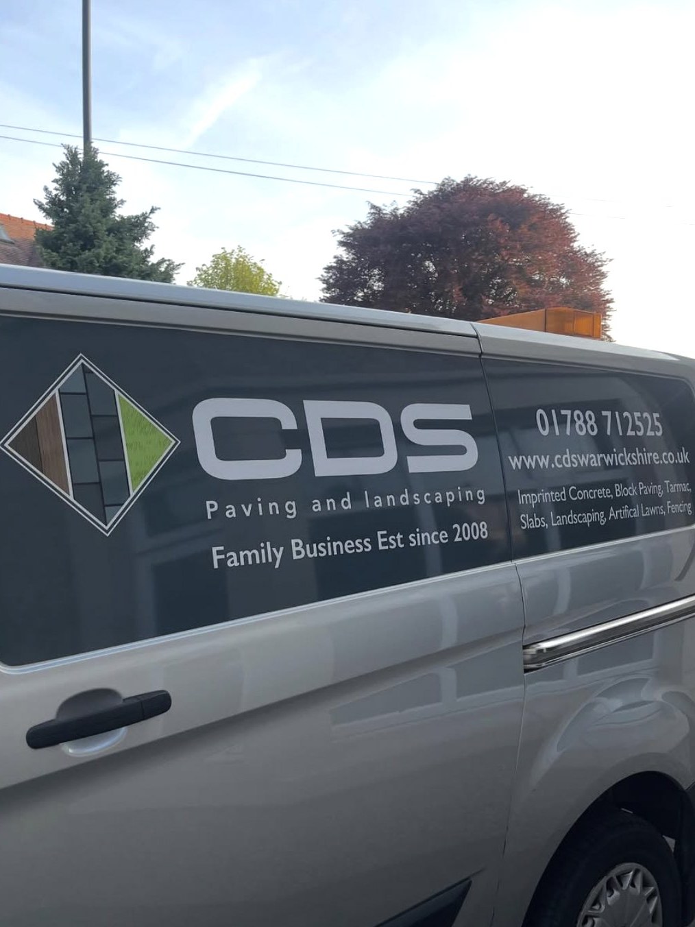 CDS Paving and Landscapes vehicle graphics on the side panel of a Ford Transit van